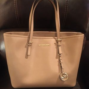 Michael Kors large satchel shoulder bag.
